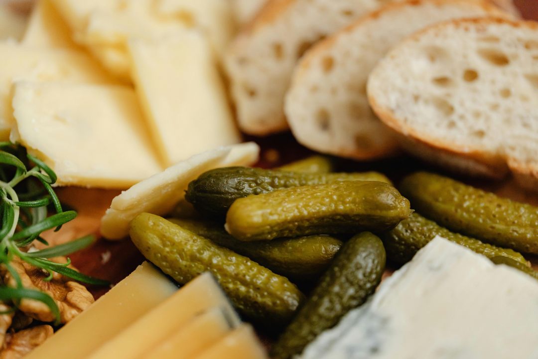 Charcuterie Board special with pickles, cheeses and fresh bread